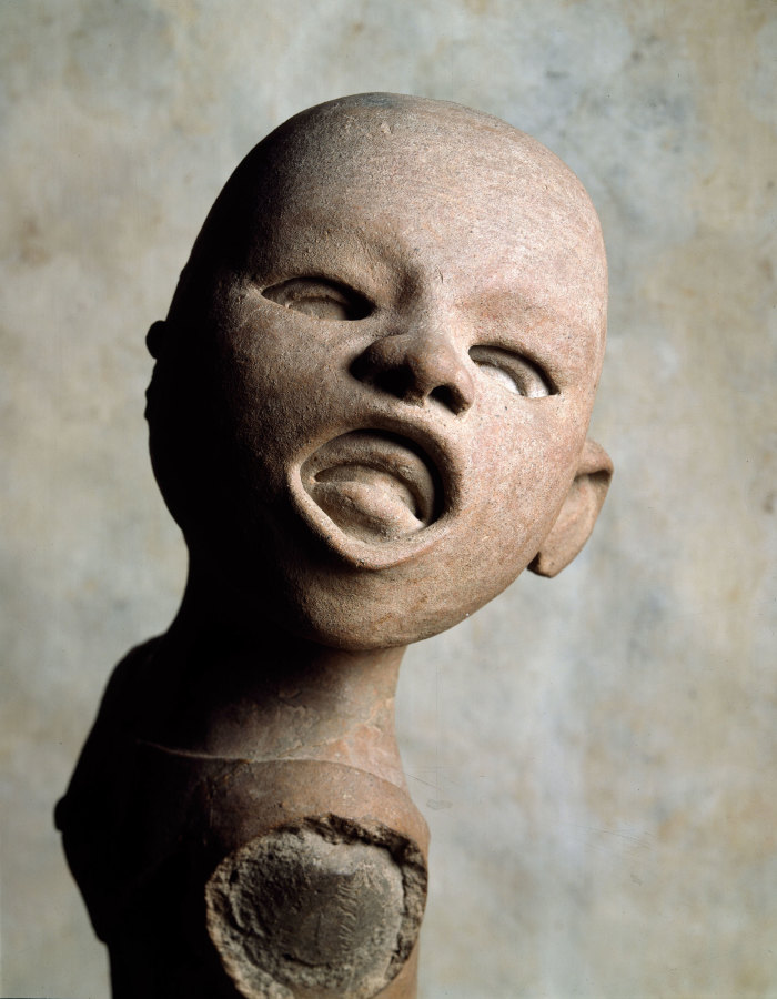 Joven con máscara devocional de Xipe - Totec
